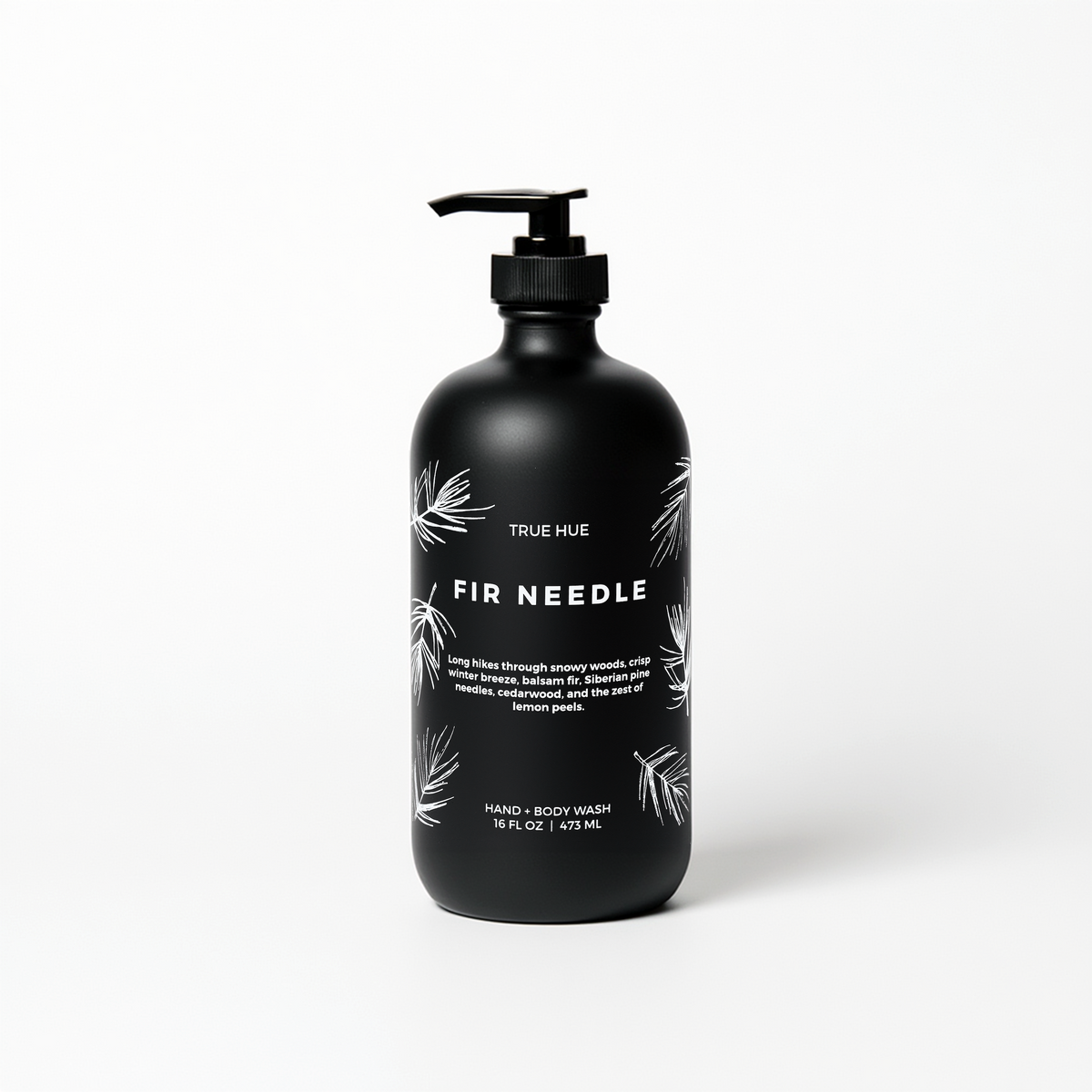 Black bottle of True Hue Fir Needle hand and body wash on a white background