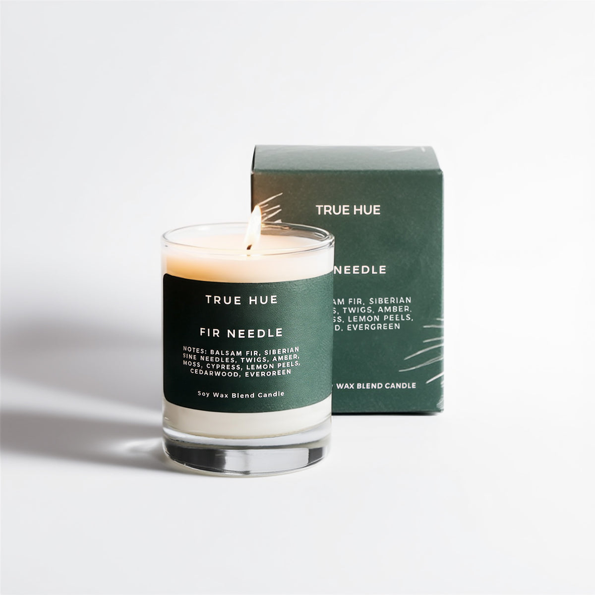 True Hue Fir Needle candle with packaging on a white background
