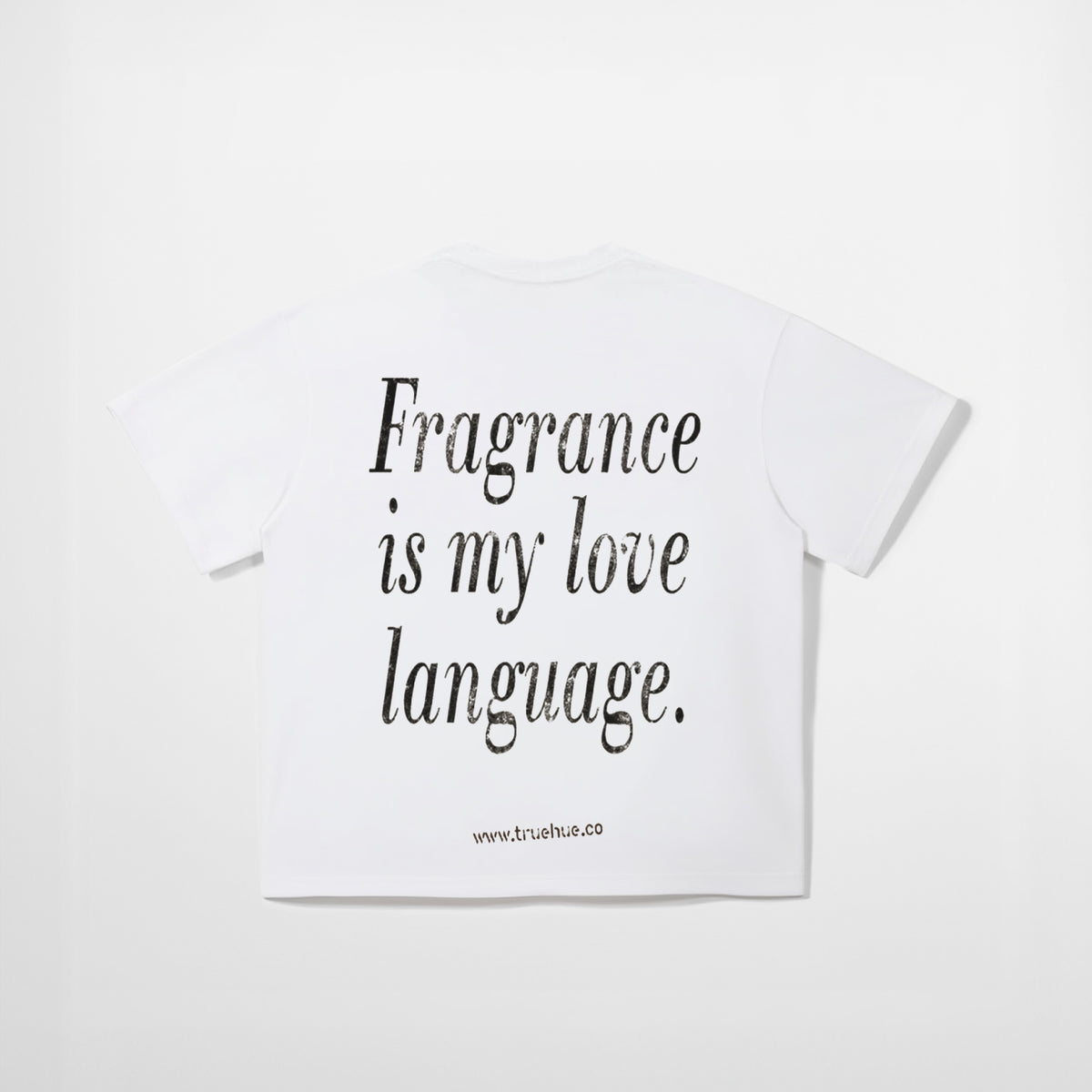 White t-shirt with black text 'Fragrance is my love language' on a white background