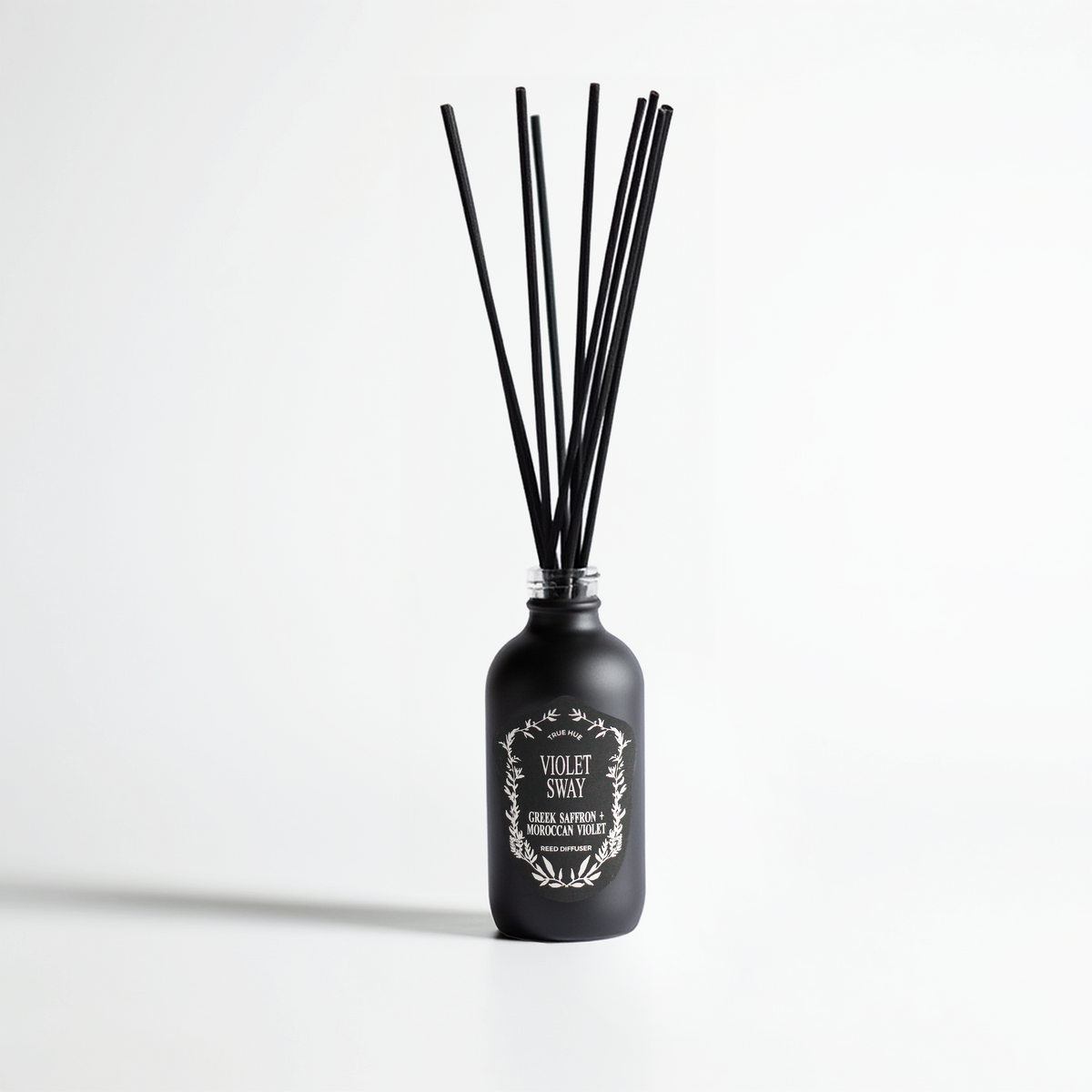 Violet Sway Reed Diffuser on light gray background.