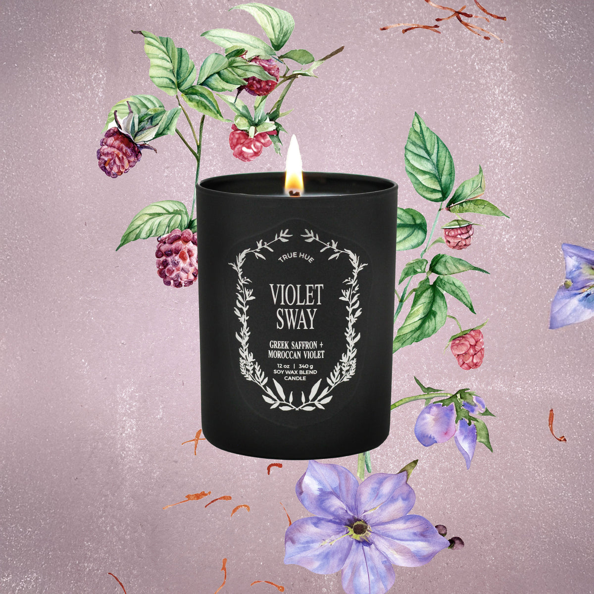 Violet Sway Candle on a light pink background with watercolor raspberries and purple flowers next to the candle.