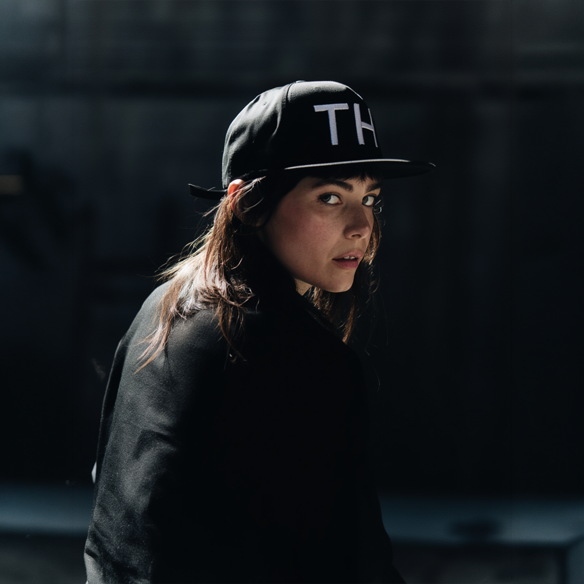 Female model wearing TH Field Hat